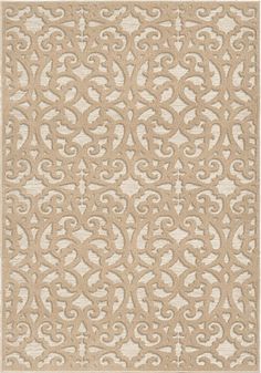 a beige rug with an intricate design on it