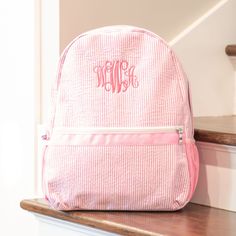 "Our Personalized Kids Backpacks are super cute and well made! These Monogrammed Seersucker Backpacks are lightweight, and perfect for kids. They also make great diaper bags, with side pockets for drinks and an exterior zipper pocket. Each of our personalized backpacks can be customized to create a truly one-of-a-kind personalized baby gift. We professionally monogram each backpack in our shop in East Tennessee, with over 60,000 monograms of experience. Our monogrammed backpacks make the sweetes Personalized Backpack Kids, Monogram Kids, Educator Gifts, Monogram Backpack, Purple Backpack, Personalized Backpack, Kids Backpack, Personalized Gifts For Kids, Embroidered Monogram