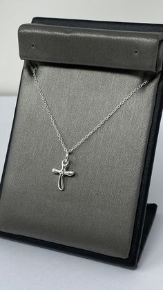 925 Sterling Silver Cross Pendant. High Polish Minimalist Cross Pendant With Diamond CZ Stone. Cross Necklace Charm. Silver Cross Necklace Our silver is genuine 925 sterling silver. You will receive the item in a gift pouch. This is a beautiful necklace, sure to make you feel special. Treat yourself or give as a gift! Perfect for everyday wear! ------------------------------------- Do Visit our Shop for more jewelry: https://www.etsy.com/shop/InsiaJewelry ---------------------------------- All j Silver Polished Cross Pendant, Silver Tarnish-resistant Cross Necklace For Gift, Adjustable Silver Cross Necklace, Nickel Free, Sterling Silver Nickel-free Cross Necklace, Nickel-free Sterling Silver Cross Necklace For Gift, Stone Cross, Silver Cross Necklace, Sterling Silver Cross Pendant, Silver Cross Pendant