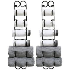 two metal racks holding towels and glasses on top of each other in front of a white background