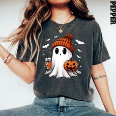 Comfort Colors® Cute Ghost Tee, Ghost Halloween T-Shirt, Halloween Women's Shirt, Halloween Pumpkin Shirt, Gift For Halloween, Halloween Tee A Comfort Colors shirt is a type of casual t-shirt that is known for its softness, relaxed fit, and muted color palette. Typically made from 100% cotton, these shirts have a vintage feel and are often favored for their comfortable, worn-in look. This classic unisex jersey short sleeve and long sleeve tees fits like a well-loved favorite. Soft cotton and qua Spooky Cartoon Print T-shirt For Fall, Fall Spooky Cartoon Print T-shirt, Halloween Funny Print Orange T-shirt, Orange Halloween T-shirt With Funny Print, Novelty Halloween T-shirt For Streetwear, Halloween Novelty T-shirt For Streetwear, Halloween Orange T-shirt With Cartoon Print, Orange Halloween T-shirt With Cartoon Print, Halloween Novelty Streetwear Top