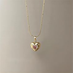 Charming Pink Crystal Heart Chain Necklace Add instant charm to your outfit with our Charming Pink Crystal Heart Chain Necklace. The delicate chain and sparkling heart-shaped crystal make this necklace a lovely addition to any ensemble. Embrace your cute and lovable side with this adorable accessory. Pink Girly Things Accessories, Pink Heart Pendant, Heart Chain Necklace, Pink Heart Necklace, Cute Necklaces, Heart Jewellery, Sweet Necklace, Accesories Jewelry, Gold Girl