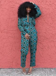 Here's a unique African Jumpsuit made with 100% African wax cotton. Made with love in Nigeria zipper at the back Lined Alterations to the style and fabric print of the jumpsuit can be made on request. Custom measurements are welcomed (preferred) but its absolutely fine if you don't have your measurements, Our size chart is pretty accurate. Measurements needed: -bust -waist -hips -thigh -height Care instructions: Wash with mild soap Do not bleach Do not machine wash Kindly chat me up via Etsy con African Jumpsuit, African Print Pants, African Print Jumpsuit, Ankara Tops, African Print Tops, Style Africain, African Fashion Ankara, African Fashion Modern, African Inspired Fashion