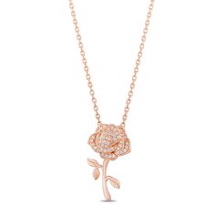 Inspired by the iconic enchanted rose from the Beauty And The Beast, this pendant features an intricately designed rose motif that exudes a sense of romance and sophistication. The 10K rose gold pendant is adorned with 1/10 CTTW. diamonds, each one meticulously set to enhance the brilliance and beauty of the piece. Wear it as a symbol of enduring love, resilience, and the timeless elegance. Luxury Rose Design Necklace For Anniversary, Luxury Rose Design Necklaces, Luxury Rose Design Necklace For Gift, Gold Earrings For Kids, The Beauty And The Beast, Gold Earrings Indian, Enchanted Disney, Enchanted Disney Fine Jewelry, Disney Fine Jewelry