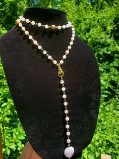 This chain is 30 inches long with a 7 inch drop from the top of the hand centerpiece. This necklace does not have a clasp and probably won't wrap around, I just had to do that to make it fit on my stand!  This piece is made of genuine Australian pink opal, rose quartz, and peach moonstone 💖 Rosary Chain Necklace, Cute Polymer Clay, Crystal Necklaces, Peach Moonstone, Quartz Rose, Pink Opal, Heart Of Gold, Wrap Around, Body Jewelry