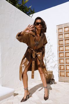 Length from shoulder to hem of size S: 128cm. Brown trench coat. Model is a standard S and is wearing size S. Lined. Gentle cold machine wash, do not tumble dry, warm iron. True to size. Button closure. Waist-ties. Twin inseam hip pockets. PU. Feel That Chill Then, it's time to bring the fire with this faux leather coat. This has an elegant double button detail with a structured fit, making it the perfect coat for any look. Style yours with heels and sunnies. Trench Coat Brown, Faux Leather Trench Coat, Brown Trench Coat, Faux Leather Coat, Perfect Coat, Leather Trench, Leather Trench Coat, The Fire, Leather Coat