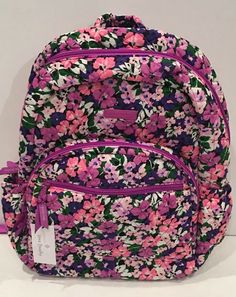 Vera Bradley Essential Backpack - Quilted Flower Garden Pattern New with Tags Quilted cotton-lightweight, durable, machine washable Double zip main compartment with a padded laptop sleeve inside in solid nylon Front zip pocket with ID window and pencil slips Two side slip pockets for water bottles etc. Top handle plus adjustable and padded shoulder straps Measures approximately 12 inches (W) x 16.5 inches (H) x 6 inches (D) several bags are available and pattern placement may vary with each Auth Spring Floral Print Casual Backpack, Floral Print Backpack For School In Spring, Floral Print Backpack For Everyday Use In Spring, Spring Backpack With Floral Print For Everyday Use, Spring Floral Print Backpack For Everyday Use, Spring Floral Print Backpack For Daily Use, Multicolor Floral Print School Bags, Spring Floral Print Standard Backpack, Spring Travel Backpack In Multicolor