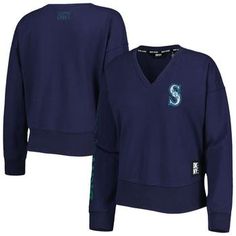 Upgrade your collection of official Seattle Mariners apparel by picking up this Lily pullover sweatshirt from DKNY Sport. It features a stylish V-neck and the team's unmistakable logo, which means you can make a fashion statement while showing your support for your beloved squad. The relaxed feel of this lightweight top is sure to make it your next go-to option for Seattle Mariners game day. V-neck Machine wash, tumble dry low Officially licensed Pullover Embroidered Logo Long sleeve Screen prin Casual V-neck Sweatshirt For Streetwear, Sporty V-neck Sweatshirt For Fall, Cotton V-neck Sweater For College, Cotton V-neck Sweater For Streetwear, Casual Blue V-neck Sweatshirt, V-neck Sweatshirt For Fall Streetwear, Casual V-neck College Sweatshirt, Sporty Cotton V-neck Sweatshirt, Sporty V-neck Sweatshirt For Streetwear