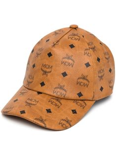 Visetos monogram print cap from MCM featuring cognac brown, black, canvas, signature Visetos print and curved peak. | MCM Visetos monogram print cap Luxury Beige Visor Baseball Cap, Luxury Brown Hat With Embroidered Logo, Classic Brown Baseball Cap With Curved Visor, Luxury Brown Hat With Curved Brim, Designer Beige Baseball Cap, Designer Brown Hat With Embroidered Logo, Luxury Beige Baseball Cap With Curved Brim, Trendy Brown Baseball Cap With Curved Visor, Luxury Beige Baseball Cap