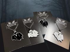 This handmade ghost necklace features a black or white ghost charm of your choice on a stainless steel chain. Wear it layered with other necklaces for your own personal statement.  Product details Charm is your choice black or white enamel plated If you choose charm only you will receive it on a matching ring. Also available ghost necklace in silver or bronze. See last pics and visit simple necklaces to purchase.  Check out more necklaces here: https://www.etsy.com/shop/AnEnchantingCreature?ref=seller-platform-mcnav§ion_id=21978338 Thank you for supporting Small Business  VISIT MY SHOPS HERE   * http://www.etsy.com/shop/HappyCatHouse * http://www.Etsy.com/shop/AnEnchantingCreature  CONNECT  * http://www.facebook.com/EnchantingCreature * https://www.instagram.com/enchantingcreature/ * https Sheet Ghost, Enamel Plate, Black Halloween, Emo Fashion, Matching Rings, Creating Jewelry, Simple Necklace, White Enamel, Stainless Steel Chain