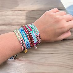 Our Wayuu bracelets are made with Cotton and Swarovski crystals.  Each piece is 100% handmade giving you a boho style and elegance for any outfit. Each piece is unique, based on one feeling, one color, one moment, one sensation. Item Detail Material: Cotton Thread, Gold plated Kana's, Charm Size: Adjustable colors: Multi colors If you want to see more beautiful products, click here to go to my shop: https://www.etsy.com/shop/kanasbracelets Share your pictures with our community through our socia Bracelets Macrame, Bracelet Macrame, Summer Bracelet, Bracelet Stacking, Woven Bracelet, Women Bracelet, Summer Bracelets, Boho Bracelet, Bracelet Boho