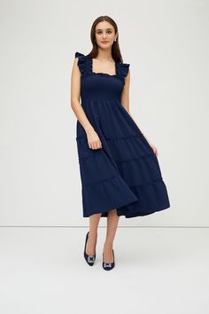 Meet the wear-everywhere Nap Dress®.  It’s our signature garment; soft, comfortable, and pretty enough to wear all day and night. The Ellie is an A-line Nap Dress® with elasticated smocking, ruffled shoulders, tiered midi skirt, and pockets.About the FabricOur new crepe fabric is woven from GRS-certified 100% recycled post-consumer plastics like water bottles, giving a (stylish!) second life to materials that would otherwise be sent to the landfill. It has a beautiful drape that’s dressier than Nap Dress, Tiered Midi Skirt, House On A Hill, Beautiful Drapes, Crepe Fabric, Day And Night, Second Life, Smocking, Water Bottles