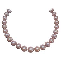 14k yellow gold freshwater Edison natural pink pearl necklace. The length of this necklace is 18 inches, the width is 13-15 mm, has a pearl clasp to open and close, and it has a total weight of 114.1 grams. Pink Akoya Pearl Single Strand Necklace, Pink Pearl Necklace With High Luster, Formal Pink Akoya Pearl Necklace, High Luster Pink Pearl Necklace, Formal Pink High Luster Necklace, Pink Single Strand Akoya Pearl Necklace, Pink Akoya Pearl Necklaces With Round Beads, Pink Akoya Pearl Round Bead Necklace, Classic Pink Round Pearl Necklace