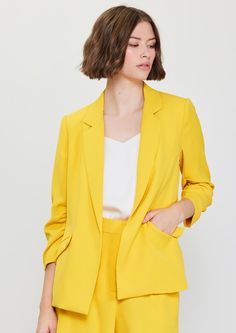 Introducing our Casual Blazer in Marigold Yellow! This lightweight blazer features 3/4 ruched sleeves, a bright yellow hue, and a contrasting floral print lining. Perfect for adding a pop of color to your work wardrobe. (Just don't blame us if this jacket steals the show!) Vacation Dresses Casual, Wedding Guest Dress Trends, Marigold Yellow, Lightweight Blazer, Casual Wedding Dress, Classic Blazer, Casual Blazer, Sweater Sale, Work Wardrobe