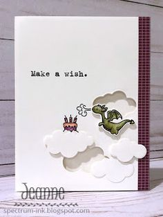 a handmade card with an image of a dinosaur flying in the sky on a cloud