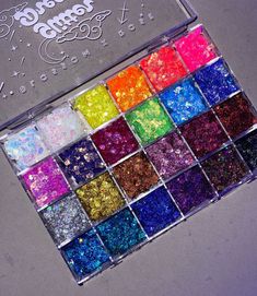 24 Glitter Gel Palette. Glitter Dreams, the ultimate collection of 24 long wear glitter gels that will make all your dreams come true! A ton of production went into creating this unique logo and design done by me, Blossom. Each gel features a unique blend of multi-dimensional glitters, providing unique sparkle that will make you shine. With Blossom X Rose Glitter Gels, you won't need to worry about messy loose fall out, as the glitters are already coated in an adhesive gel formula, making glitter application easier than ever! Plus mix the shades to concoct your own little custom glitter gel. *5-7 grams/colour   Share your new 24 glitter palette on Social Media and Tag us @blossomxrose   HOW TO USE: * For the best colour pay off, use a synthetic flat eye brush or finger, pick up the product Iridescent Makeup, Glitter Palette, Metallic Eyeliner, Rose Glitter, Makeup Glitter, Graphic Eyeliner, Birthday Activities, Mermaid Parties, Glitter Eyeliner