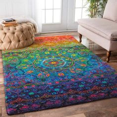 a multicolored area rug in a living room