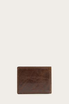 The slim profile of the 'Logan' billfold with a signature stamp detail is an alternative to a bulky wallet. This piece is made from antique pull up leather that will age beautifully with wear and will be admired by those who enjoys the finer things. Fitted with multiple slots and sleeves to keep your notes and cards organized and we all know that a well-made wallet is a non-negotiable. Classic Vintage Brown Leather Wallet, Vintage Brown Bifold Wallet With Coin Pocket, The Frye Company, Signature Stamp, Men's Wallets, Men Wallet, Gift Inspo, Id Wallet, Aging Beautifully