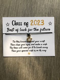 a bracelet with a star charm on it that says class of 2012 best of luck for the future