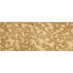 a close up view of the surface of a counter top with gold and white speckles