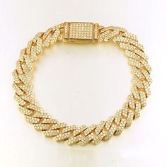 This stunning 12mm width solid men's Cuban chain bracelet features 6.50 carats diamonds professionally set pave on every link. The three diamonds flow beautifully throughout the links and hidden clasp and sparkle from every angle. Customize your bracelet and make it your own. Metal : 14K Solid Gold Approx. Weight : 40 Grams Setting Type : Pave Width : 12 mm Length : 8", 8.5", 9" Total Carat : 6.50 Carats Type : Natural Diamonds Shape : Round Cut Carat Weight : 6.50 Ct. Cut : Excellent Color : G- Trap Style, Cuban Chain Bracelet, Display Counter, Fashion Accessories Trends, Chain Diamond, Ideas Jewelry, Gold Wedding Jewelry, Jewelry Statement, Simple Ideas