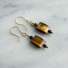 "Pretty, tapered rectangles of Tiger Eye and Picasso Jasper dangle from gold-filled earwires.  Earring, including earwire, is 2\"." Tiger Eye Earrings, Tiger Eye Jewelry, Picasso Jasper, Jasper Earrings, Eye Earrings, Eye Jewelry, Tiger Eye, Jewelry Earrings Dangle, Gold Earrings