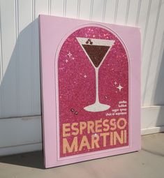 a pink box with an image of a martini on it