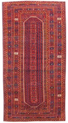 This eccentric but majestic Central Asian carpet was most probably woven by recently settled former nomads in an oasis town in the region of the middle Oxus River. The colors, especially the reds, are vibrant and all derived from natural vegetal sources. While the stripes of the border and field create a heavily vertical directionality, a rather charming feature of this rug is the large pseudo-medallion that is created by the niched areas at top and bottom. The village weavers have retained and Asian Rugs, Rugs And Carpet, The Village, Rugs On Carpet, Oasis, 19th Century, Bohemian Rug, Carpet, Stripes