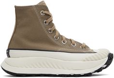 High-top canvas sneakers in taupe. · Round rubber cap toe · Lace-up closure · Embroidered logo patch at inner side · CX foam rubber midsole in off-white · Treaded rubber outsole in black · Platform: H1.5 in Supplier color: Sandalwood/Egret/Black | Converse Taupe Chuck 70 AT-CX Sneakers Brown Canvas High-top Sneakers With Vulcanized Sole, Beige High-top Canvas Sneakers With Vulcanized Sole, Beige Canvas High-top Sneakers With Vulcanized Sole, Beige High-top Canvas Sneakers, Beige Canvas High-top Sneakers With Gum Sole, Beige Canvas High-top Sneakers, Brown Canvas High-top Sneakers, Beige Sporty Sneakers With Rubber Toe Cap, Converse Beige Canvas High-top Sneakers