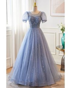 Blue Sequined Ball Gown With Fitted Bodice, Fitted Quinceanera Dress For Prom, Fitted Quinceanera Dress For Prom Season Homecoming, Fitted Quinceanera Dress For Homecoming And Prom Season, Fitted Sequined Ball Gown Quinceanera Dress, Fitted Princess Style Quinceanera Dress For Banquet, Fitted Princess Quinceanera Dress For Banquet, Sequin Fitted Quinceanera Dress For Debutante Ball, Fitted Sequined Quinceanera Ball Gown