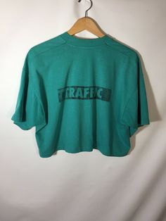 Vintage Winnipeg Crop Tee 90s Green Letter Print Tops, 90s Green Tops With Letter Print, 90s Style Green T-shirt For Spring, Tan Tops For Spring Streetwear, Oversized Green Logo Print Tops, Urban Green Top With Letter Print, Urban Green Tops For Spring, Urban Style Green Tops For Spring, Retro Tan Crew Neck Top