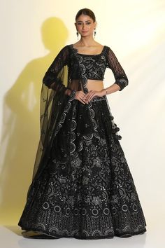 Black cancan attached lehenga featuring floral sequin, cutdana and resham work all over. Paired with a sequin, bead embellished padded blouse and dupatta that has scallop border. - Aza Fashions Party Wear Semi-stitched Sharara With Sequins, Evening Dupatta With Intricate Embroidery, Festive Evening Sharara With Mirror Work, Fitted Net Choli With Intricate Embroidery, Festive Dupatta With Intricate Embroidery For Evenings, Festive Evening Dupatta With Intricate Embroidery, Fitted Net Lehenga With Intricate Embroidery, Embellished Lehenga For Party, Fitted Lehenga With Intricate Embroidery In Net