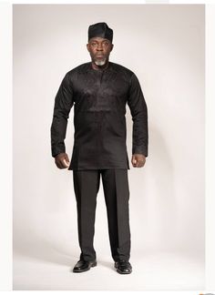 Handsome piece to walk into a party. High quality cotton with black embroidery on the chest. Long sleeves, long enough for the tall guys too. Black Embroidered Long Sleeve Shirt, Traditional Black Long Sleeve Shirt, Traditional Long Sleeve Black Shirt, Traditional Black Crew Neck Top, Black Embroidered Cotton Shirt, Black Embroidered Crew Neck Shirt, Traditional Black Cotton Shirt, Traditional Black Embroidered Shirt, Traditional Black Cotton Top