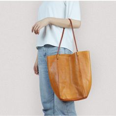 Free U.S. shipping. Style: Vintage , color:Tan, suite for season：Summer, Autumn, Winter ，Music Festival, Travel, Work, Material Genuine Leather, Tan Large Vegetable Tanned Leather Tote Bag Casual Cognac Shoulder Bag With Leather Handles, Casual Rectangular Shoulder Bag With Leather Lining, Summer Soft Leather Shoulder Bag, Casual Shoulder Bag With Leather Lining For Daily Use, Summer Light Brown Leather Shoulder Bag, Leather Bucket Shoulder Bag For Summer, Summer Brown Leather Shoulder Bag, Casual Cognac Tote Shoulder Bag, Brown Leather Shoulder Bag For Summer