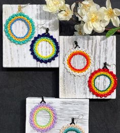 These earrings reflect the cultural traditions of indigenous artisans from Chiapas Mexico. It can take up to an hour to finish every pair. We know you're going to love them as much as we do! They are lightweight and add a pop of color to any outfit. Easy to wear from day to night.  As a special thank you every shipment will receive a FREE GIFT!! Thank you for visiting - Gracias por visitarnos!  Be sure to favorite our shop to get updates on all our new items! Handmade Colorful Hoop Earrings, Fair Trade Beaded Dangle Earrings, Handmade Round Rainbow Earrings, Handmade Rainbow Round Earrings, Traditional Multicolor Hoop Earrings, Traditional Multicolor Round Hoop Earrings, Bohemian Rainbow Hoop Earrings, Rainbow Bohemian Hoop Earrings, Handmade Multicolor Traditional Hoop Earrings