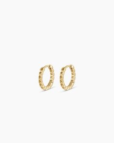 This pair of gold huggie hoop earrings is crafted from solid gold, making them a timeless and luxurious addition to any jewelry collection. Perfect for stacking or to wear alone, these solid gold hoops provide long-lasting shine. Wear yours stacked with other diamond huggie hoop earrings and studs. Wilder Huggies Earring in 14k Solid Gold, Women's by gorjana Luxury 14k Gold Silver Diamond Earrings, Luxury Yellow Gold Huggie Jewelry, Stackable 14k Gold Huggie Earrings, Yellow Gold Huggie Stackable Jewelry, 14k Gold Stackable Round Huggie Earrings, Classic 14k Gold Stackable Earrings, Stackable Yellow Gold Earrings For Anniversary, Elegant Yellow Gold Stackable Huggie Earrings, Anniversary 14k Yellow Gold Filled Huggie Earrings