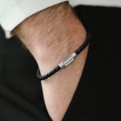 Made from soft, spongy nappa leather, Luke Landon is a comfortable accessory to wear - whether you display it on its own, or stack it with similar high-quality bracelets. One thing is certain - he is the style accessory that you have been looking for!- WIDTH: 4 mm- MATERIAL TYPE: 100% genuine nappa leather- CLASP COLOR: Brushed silver- CLASP MATERIAL: 316L stainless steel- CLASP TYPE: Magnetic Silver Jewelry For Men, Knot Design, Jewelry For Men, Bracelet Black, Nappa Leather, Leather Bracelet, Silver Bracelet, Mens Jewelry, Silver Jewelry