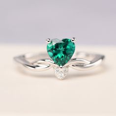 All HANDMADE ITEMS SHIP IN APPROX 8 DAYS Main Stone: Lab emerald Main Stone Size: Heart cut 6 mm x 6 mm Main Stone Weight: 0.62 carat Side Stone: CZ Height From The Ring Setting Bottom(to gemstone top): about 5.5 mm Width of Ring band Measure: gradually varied,about 1.6mm - 2.6 mm Material: 925 Sterling Silver/14K White Gold/14K Yellow Gold/14k Rose Gold Engraved: Available For FreeNo more than 13 letters) Customized:Of course! Tell me what you want Includes With Order: All of my store items com Heart-shaped Emerald Rings For Wedding, Wedding Ring With Heart Shape For May Birthstone, Elegant Heart Shaped Emerald Ring For May Birthstone, Elegant Heart-shaped Emerald Ring For May Birthstone, Green Heart-shaped Emerald Ring For Anniversary, Green Heart Ring For Wedding With May Birthstone, Green Heart Ring For Wedding, May Birthstone, Green Heart Ring For Wedding And May Birthstone, Green Heart Ring For May Birthstone Wedding