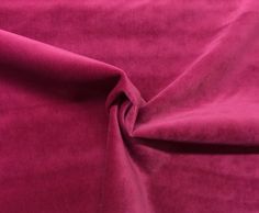 a close up view of a pink fabric