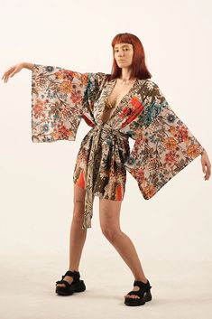 Japanese Style Patchwork Special Design Kimono with Ethnic Themes Includes Khaki and Terracotta colors Digital Printed Woven fabric Polyester This kimono comes in a standard size that fits XS to XL, ensuring a comfortable and versatile fit for various body types. The last image shows the exact colors of the product. Traditional Spring Kimono With Boho Print, Orange Bohemian Kimono With Floral Print, Traditional Floral Print Summer Kimono, Traditional Summer Kimono With Floral Print, Traditional Floral Print Kimono For Summer, Vintage Multicolor Kimono For The Beach, Traditional Printed Kimono For Festivals, Traditional Boho Print Kimono For Festival, Vintage Multicolor Kimono For Beach