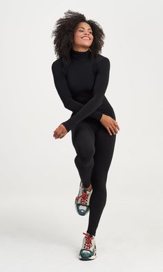 A jumpsuit which emphasizes your natural body curves thanks to its elastic fit and clean design. Perfect to wear even under a tunic, skirt or anything made of transparent fabric. * Turtleneck collar * Extra long sleeves * Fine back zipper * Made of soft high stretching fabric Long Sleeve Tight Unitard With Thumbholes, High Neck Unitard With Thumbholes, Tight Long Sleeve Unitard, Tight Long Sleeve Elastane Unitard, High Stretch High Neck Solid Unitard, High Stretch High Neck Solid Color Unitard, High Neck Solid Color High Stretch Unitard, High Stretch Elastane Unitard With Thumbholes, Stretch Elastane Long Sleeve Unitard