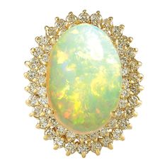 Stamped: 14K Yellow Gold Total Ring Weight: 10.5 Grams Total Natural Opal Weight is 8.78 Carat (Measures: 18.00x13.00 mm) Color: Multicolor Total Natural Diamond Weight is 1.60 Carat Color: F-G, Clarity: VS2-SI1 Face Measures: 26.55x21.25 mm Sku: [702382W] Yellow Gold Opal Ring, Sapphire Cocktail Ring, Opal Diamond Ring, Yellow Gold Diamond Ring, Opal Ring Gold, Diamond Cocktail Rings, La Face, Creative Jewelry, Gold Diamond Rings