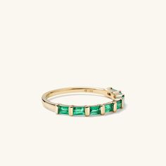 The second best thing after an actual baguette? Eight baguette emeralds set in a timeless band. Handcrafted in 14k solid gold featuring responsibly sourced gemstones. All natural emeralds have inclusions that add distinct character—so, no two gems are alike. Emerald Ring Mejuri, Baguette Eternity Band, Gold Minimalist Ring, Simple Diamond Ring, Emerald Wedding Band, Emerald Band, Eternity Ring Gold, Baguette Ring, Simple Diamonds