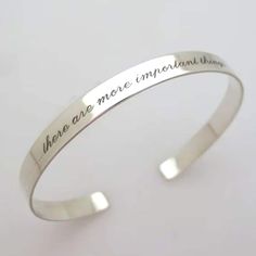 Personalized Sterling silver bracelet for her, Valentines gift, Birthday gift for her, mothers day gift etc..  Custom skinny cuff Bracelet in Sterling Silver for women. Engraved quote cuff bracelet for women. Elegant and delicate jewelry piece, fine silver bangle bracelet.  A gift to melt one's heart, Personalized cuff bracelet. Order the romantic piece to complement your collection or to make an unforgettable gift.  You may be sure, such a gift will make a day! The silver bangle bracelet is polished to a shiny finish.  Together with your idea and my work it will become an inspirational quote band!  You order what to engrave, I make the engraving carefully with the romantic script font!  The bangle cuff can be two sides engraved as well. So you may order a secret message! This piece makes Elegant Sterling Silver Bracelet With Engraving Option For Gift, Elegant Sterling Silver Bracelet With Engraving Option, Stainless Steel Bangle As Gift, Silver Bracelets For Wedding Gifts, Elegant Silver Name Bracelet For Bridesmaid Gift, Elegant Hand Stamped Name Bracelet For Mother's Day, Sterling Silver Round Cuff Bracelet Gift, Inspirational Silver Stainless Steel Bracelets, Silver Hand Stamped Bangle Bracelets