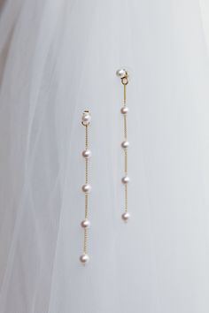 Crystal embellished earrings Gold toned Sterling silver post Push closure at back Steal the show in our stunning Gaia earrings. Featuring a pearl embellished, drop design. They're the on-trend luxe life look we are living for and are perfect for a wedding or special birthday celebration. Team them with a satin mini dress for a head-turning look. MATERIAL ALLOY/PEARLS Elegant Pearl Embellished Dangle Chandelier Earrings, Silver Chandelier Earrings With Pearl Charm, Elegant Pearl Charm Chandelier Dangle Earrings, Elegant Pearl Charm Chandelier Earrings, Elegant Pearl Clip-on Jewelry, Elegant Clip-on Plug Earrings, Pearl Chandelier Drop Earrings With Pearl Chain, Pearl Dangle Linear Earrings For Pierced Ears, Party Pearl Charm Linear Drop Earrings