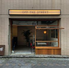 the entrance to an off the street restaurant