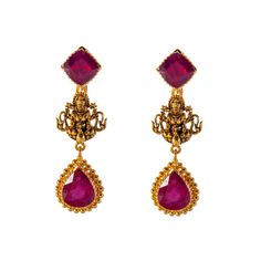 Virani Jewelers presents a gorgeous temple-style 22k gold necklace and earring set, a harmonious blend of tradition and sophistication. The intricate temple design, complemented by the warm glow of 22k gold, accentuates the allure of elegant rubies. Adorn yourself in this Indian gold necklace and earring set, a timeless expression of refined taste and cultural richness. Features • 22k yellow gold • Ruby Necklace Specifications: • Minimum Width - 3 millimeter • Maximum Width - 21 millimeters • Le Ceremonial Festive Gemstone Earrings, Gemstone Earrings For Ceremonial Festive Occasions, Spiritual Temple Necklace With Gemstones For Festive Occasions, Temple Jewelry Necklace In Yellow Gold With Gemstone, Yellow Gold Gemstone Temple Necklace For Festivals, Yellow Gold Temple Necklace With Gemstone For Festivals, Elegant 22k Gold Temple Necklace For Puja, Yellow Gold Temple Necklace With Gemstone, Yellow Gold Chandbali Temple Necklace