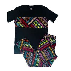 Soft comfortable pant in African print fabric + black t-shirt/bodysuit with matching fabric The pants have a no roll comfortable waistband, front pockets, Orders are made and shipped within 1-3 business days. Regular shipping takes 2-6 days, and you can also upgrade to express shipping for an additional fee. Express shipping takes 1-4 days. Please let me know if you have a date you need your order by, I'll try to accommodate that as much as I can. Please check the sizing charts in the images, se Black Printed Short Sleeve Sets, Casual Black Sets With Long Pants, Casual Black Long Pants Sets, Casual Patterned Cotton Sets, Patterned Cotton Short Sleeve Sets, Patterned Cotton Sets With Short Sleeves, Printed Stretch Short Sleeve Set, Patterned Cotton Sets With Graphic Print, Cotton Graphic Print Patterned Sets