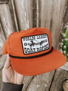 Red Dirt Hat Co. Goat Roping Cap Vintage Snapback Rodeo Hat, Vintage Snapback Baseball Cap For Rodeo, Retro Snapback Baseball Cap For Rodeo, Retro Snapback Hats For Rodeo, Adjustable Western Style Flat Cap, Western Style Adjustable Flat Cap, Vintage Adjustable Baseball Cap For Rodeo, Retro Red Hats With Flat Bill, Adjustable Retro Baseball Cap For Rodeo