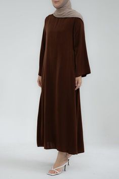 Yasmin Slip dress maxi length with a detachable belt and kimono sleeves in coffee - ANNAH HARIRI Elegant Floor-length Solid Abaya, Elegant Brown Maxi Dress With Long Sleeves, Elegant Brown Long Sleeve Maxi Dress, Elegant Long Sleeve Brown Maxi Dress, Elegant Long Sleeve Solid Color Kaftan, Elegant Belted Abaya, Elegant Long Solid Maxi Dress, Elegant Long Solid Color Maxi Dress, Elegant Solid Color Maxi Length Kaftan